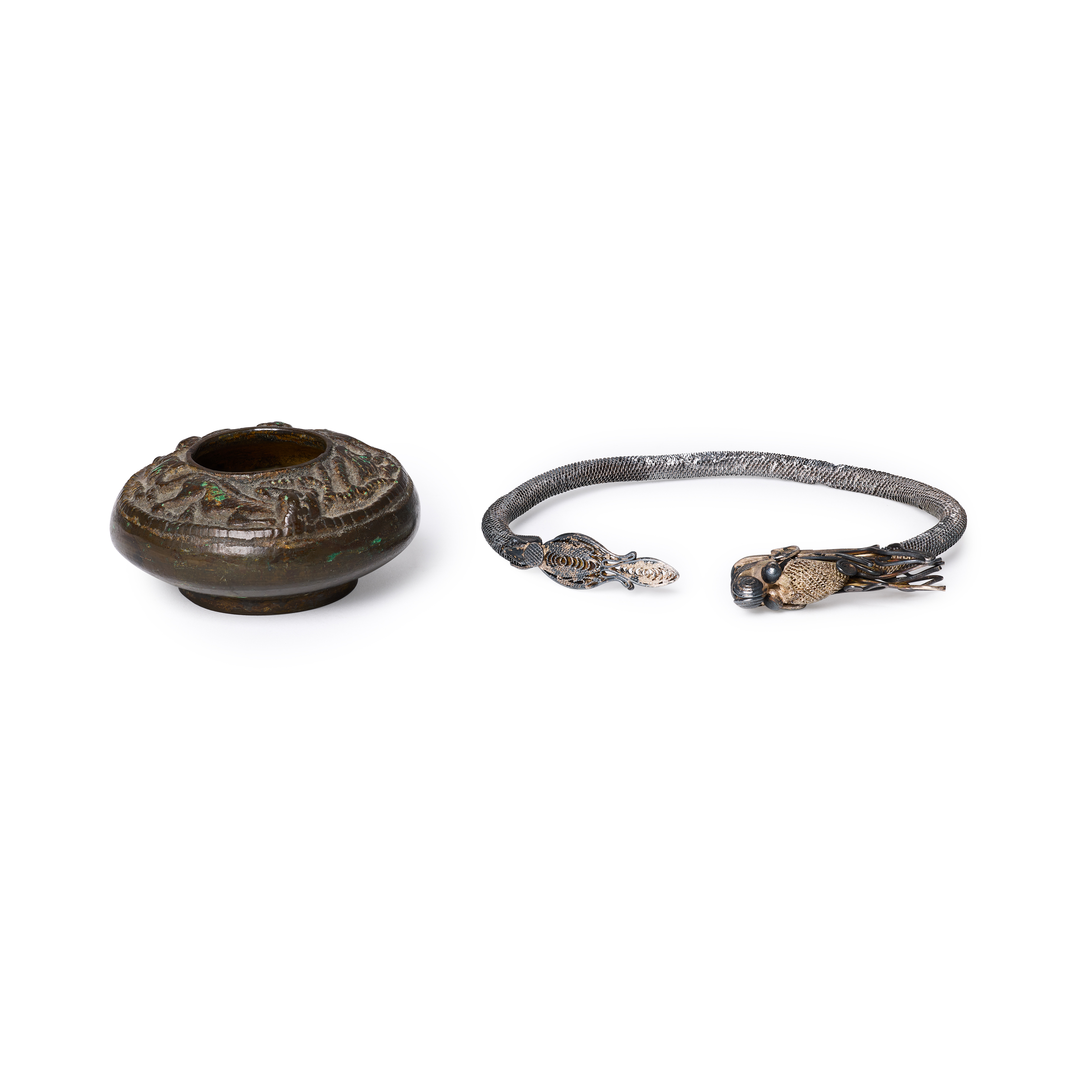 A Chinese bronze water pot and silver dragon bangle Ming dynasty and 19th century Comprising a ...