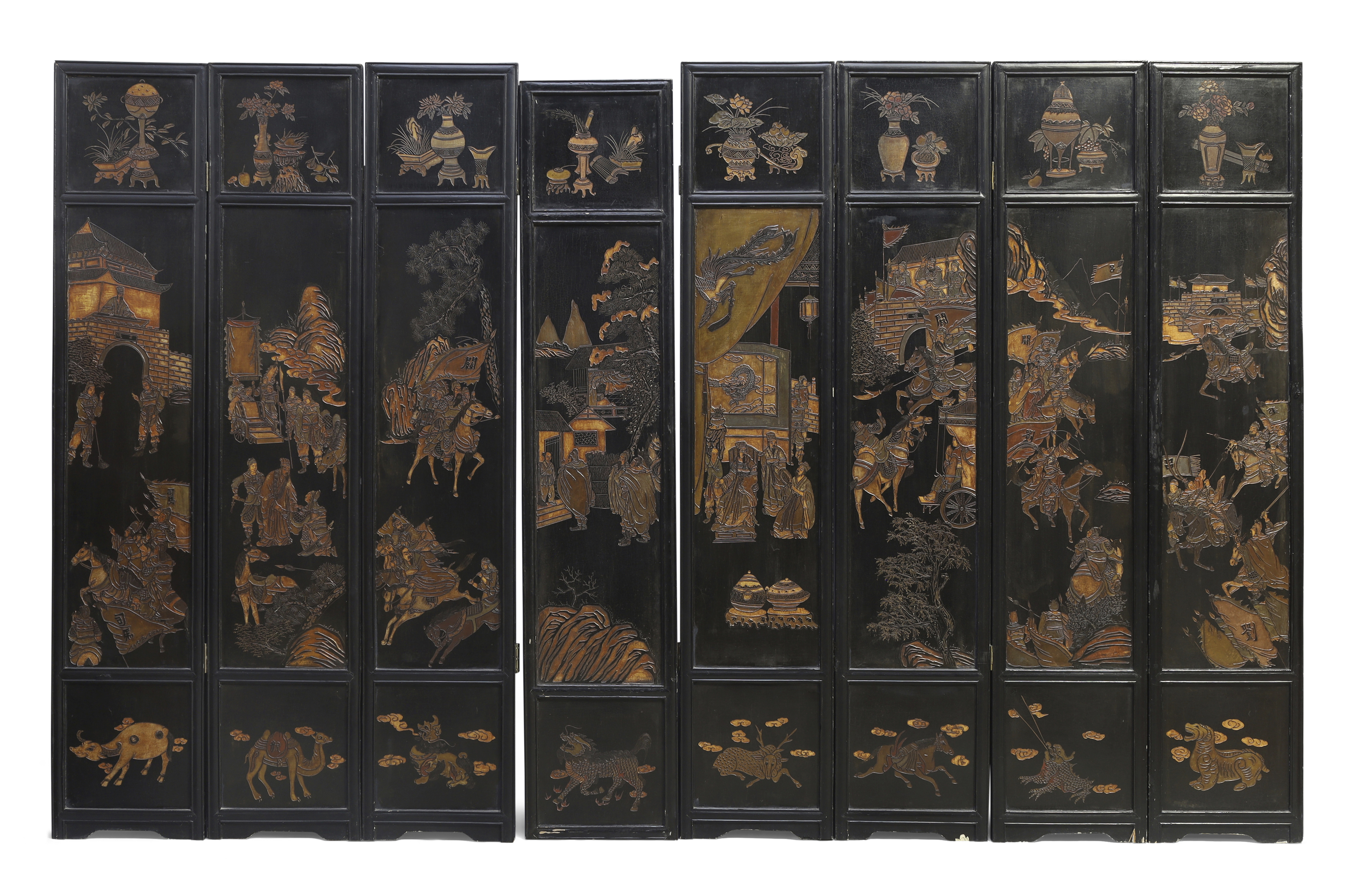 A large Chinese eight section folding screen Republic period Carved and painted to both sides w...