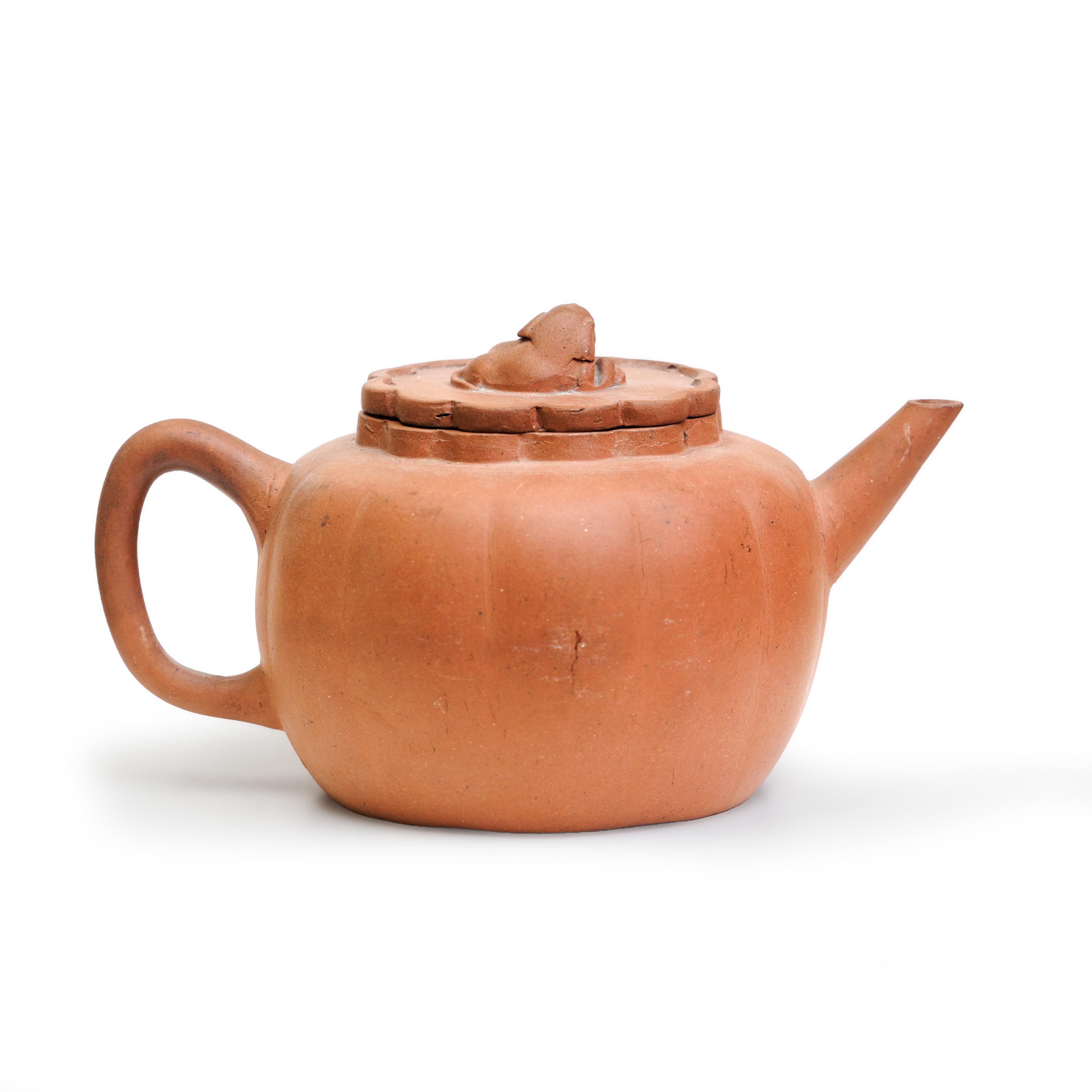 A Chinese Yixing 'melon' teapot Republic period The body fluted to form a melon, the shaped cov...