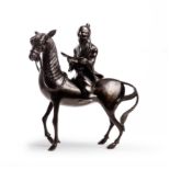 A Chinese bronze figure of a scholar and horse Ming dynasty The detachable figure cast as a sch...