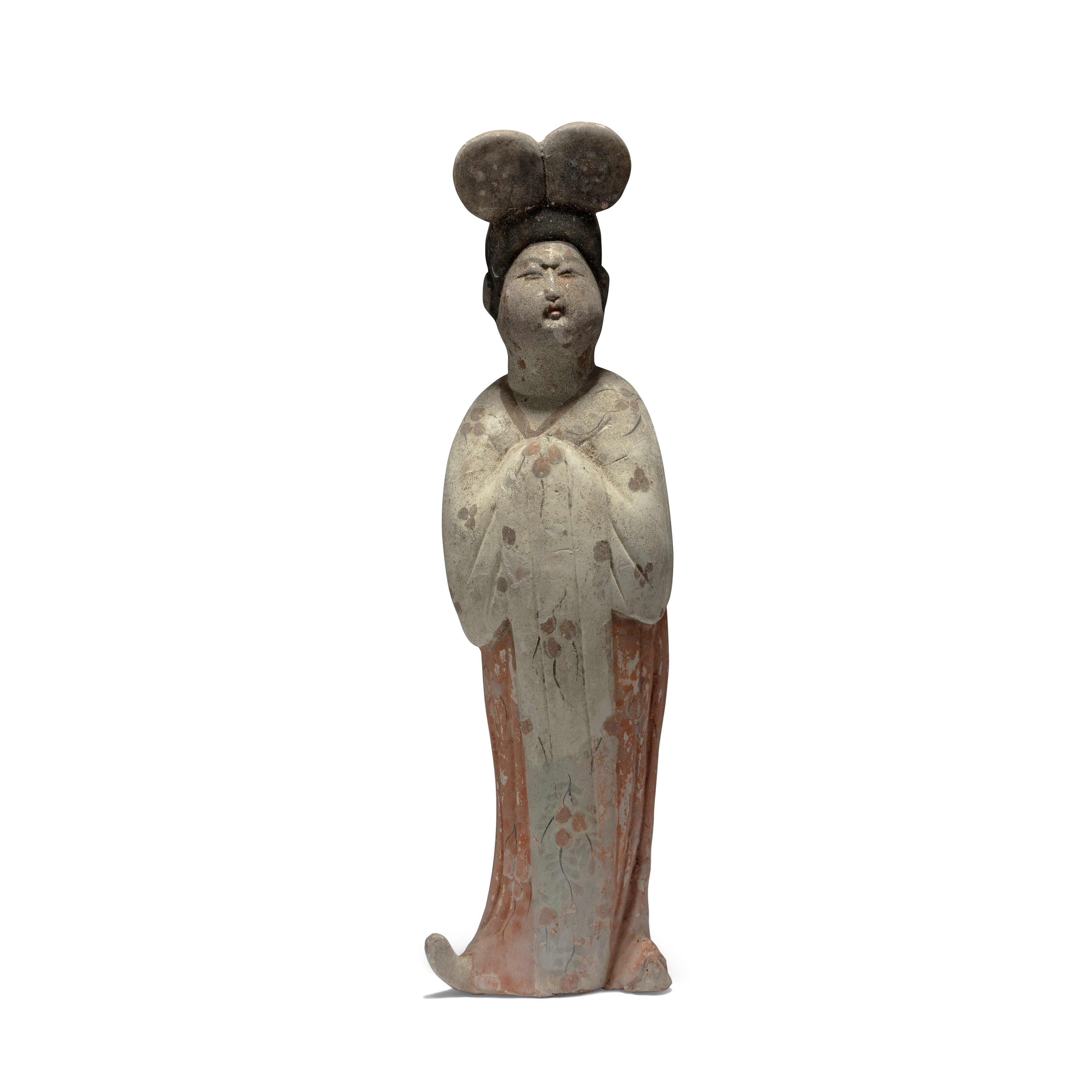 A Chinese pottery figure of a court lady, Tang dynasty, Modelled standing with hands held to he...