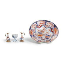 Two Chinese miniature blue and white 'clobbered' double gourd vases, a blue and white stem cup, a...