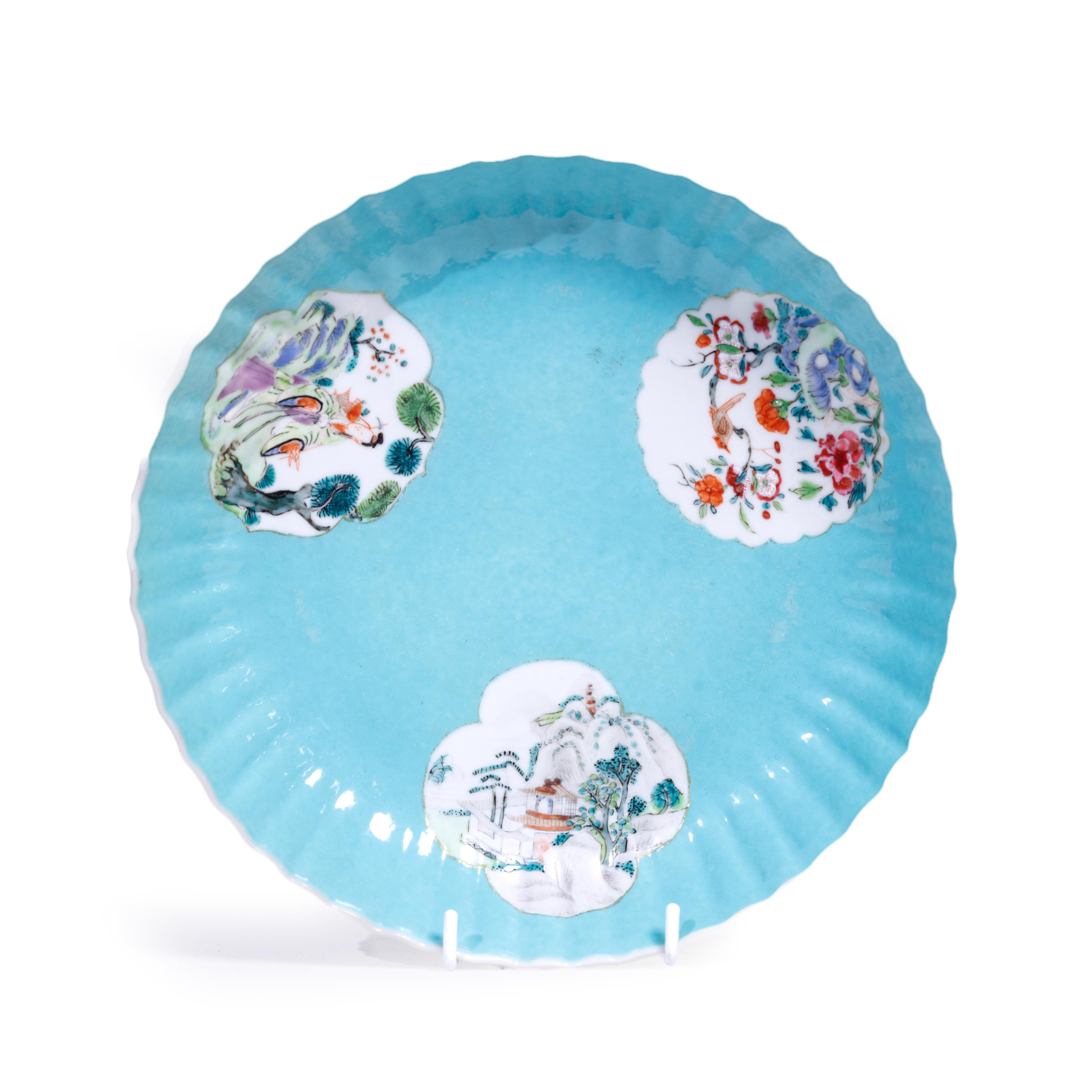 A Chinese famille rose fluted dish Late Qing dynasty Decorated to the interior with three panel...