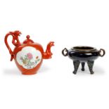 A Chinese iron red teapot and a flambé tripod incense burner Late Qing dynasty and 20th century ...