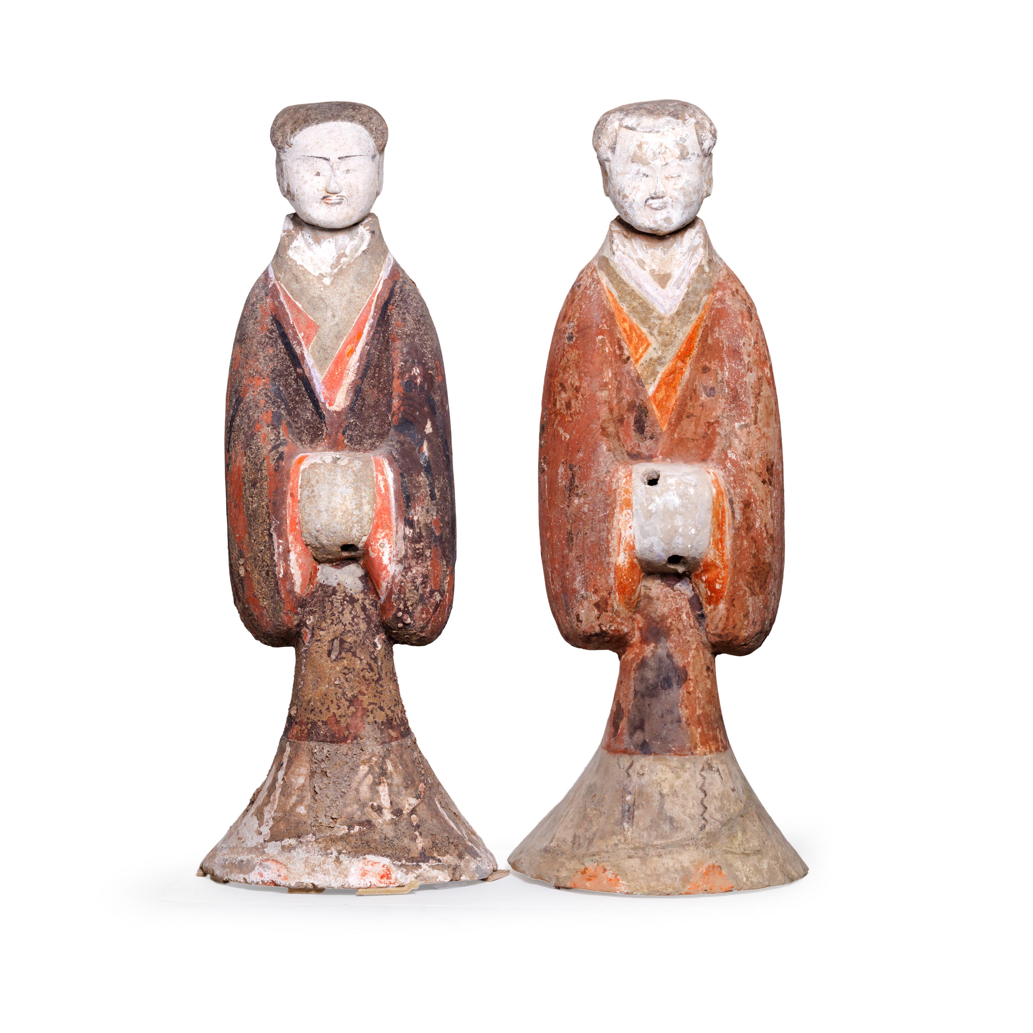 Four large Chinese pottery figures of attendants Han dynasty Each modelled standing wearing pai... - Image 2 of 3