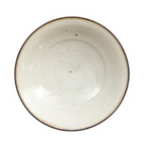 A Chinese 'Ding-style' qingbai-glazed dish  Song dynasty The dish thinly potted with a stepped ...