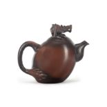 A Chinese Yixing teapot with moulded dragon finial 20th century Of tilted ovoid form with C-sha...