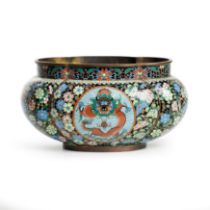 A Chinese cloisonné lobed vase, Republic period, Decorated to each side with a dragon medallion...