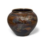 A Chinese Henan russet-painted black-glazed jar Song dynasty The wide mouthed, tapering vessel,...