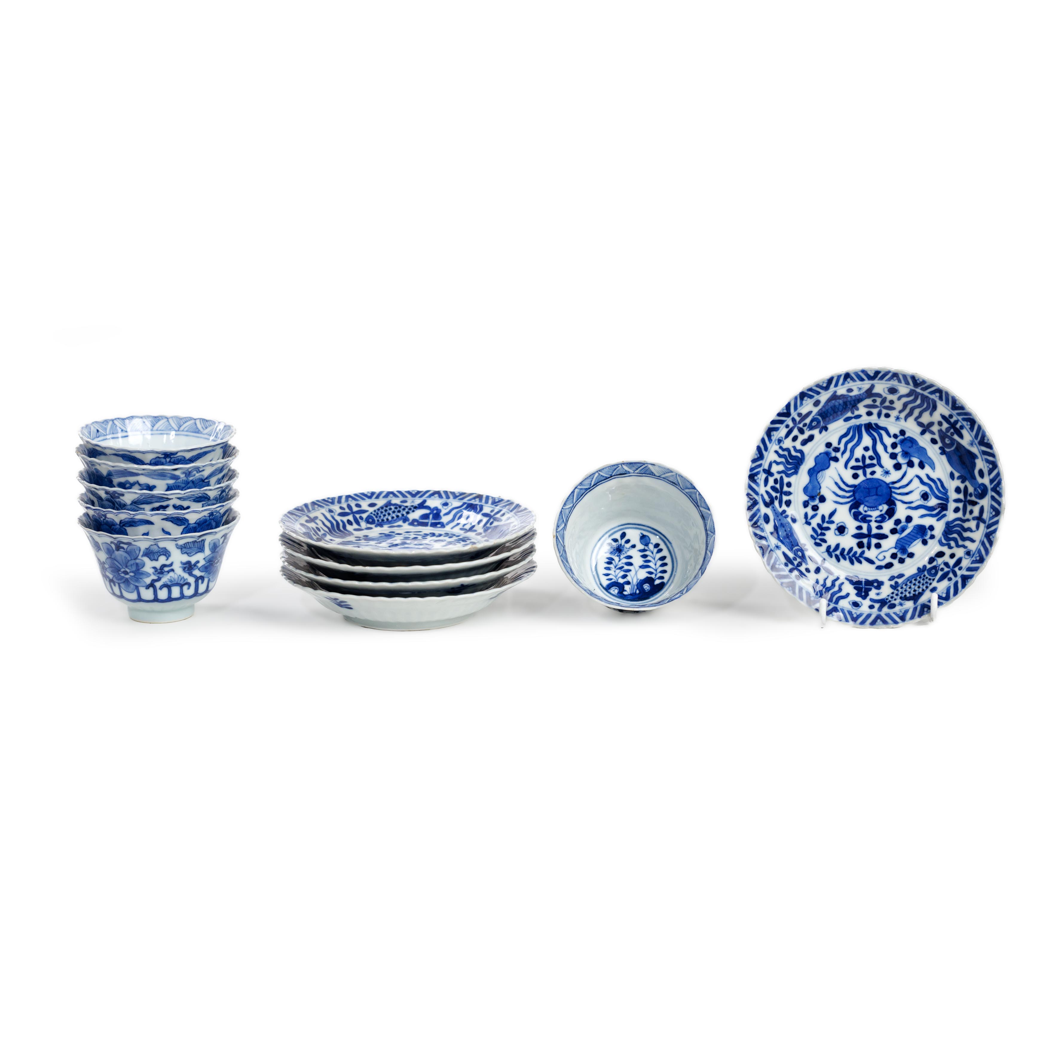 Six Chinese blue and white 'floral' cups and five 'sea creatures' saucers Late Qing dynasty, apo...