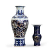 A Chinese powder blue gu vase and a blue and white and copper red peony vase Qing dynasty, 19th ...