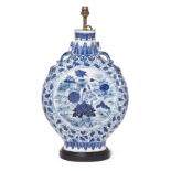 A Chinese blue and white moonflask Qing dynasty, 19th century Painted to one side with a centra...