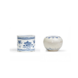 A Chinese blue and white pounce pot and a Annamese box and cover 15th and 18th century The poun...