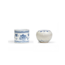A Chinese blue and white pounce pot and a Annamese box and cover 15th and 18th century The poun...