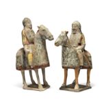 Two Chinese painted pottery riders on horseback Six Dynasties, Northern Qi Each horse standing ...