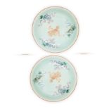 Three Chinese famille rose 'lion dog' dishes Qing dynasty, 19th century Painted to the interior...