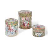 Three Chinese Canton famille rose cylindrical boxes Qing dynasty, 19th century Variously decora...