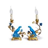 A pair of Chinese turquoise glazed parrots mounted on gilt lamps, Qing dynasty, 18th century Ea...