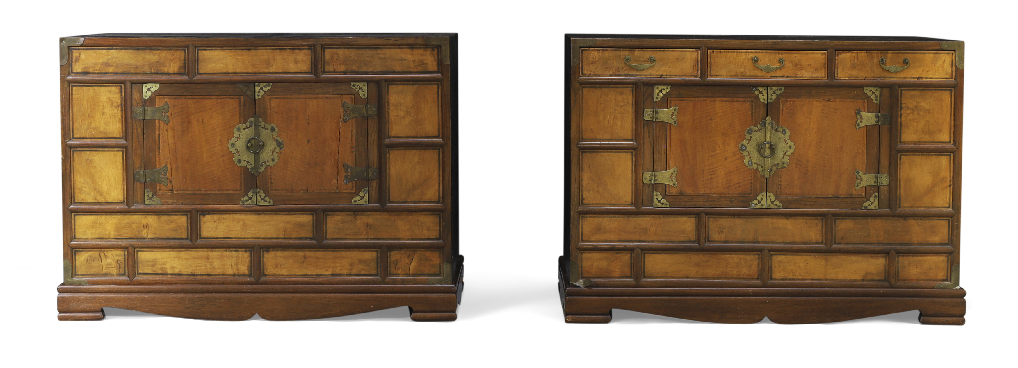 A pair of Chinese softwood cabinets Early 20th century With three frieze drawers above pair of ...