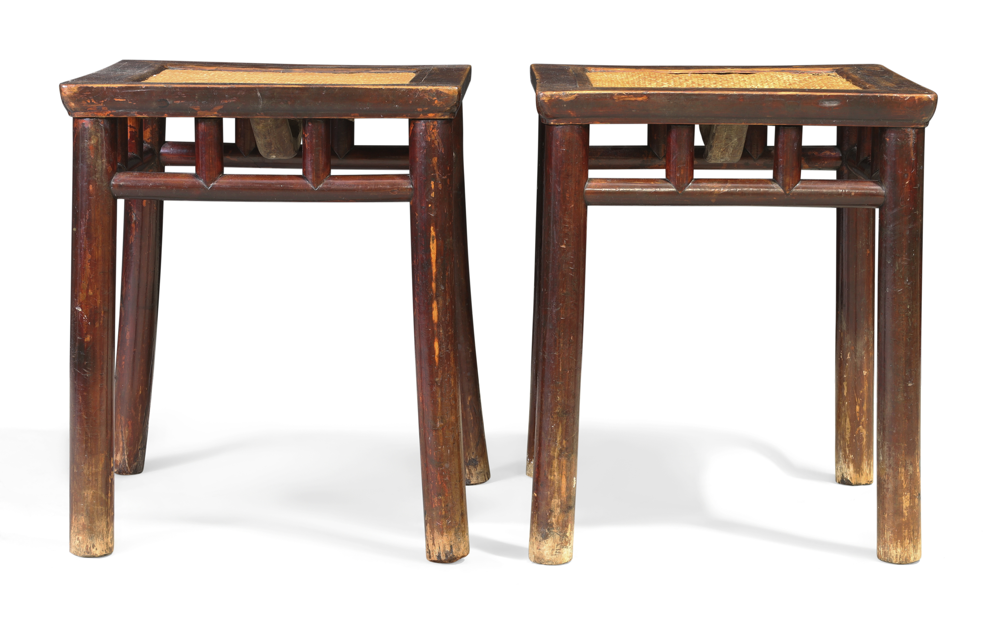 A pair of Chinese provincial lacquered elm stools, Late Ming dynasty, 17th century The square t...