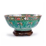 A Chinese Canton famille rose 'baicai' punchbowl Qing dynasty, 19th century Elaborately painted...