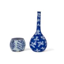 A Chinese blue and white lead filled stand with a European bottle vase 19th century The base de...