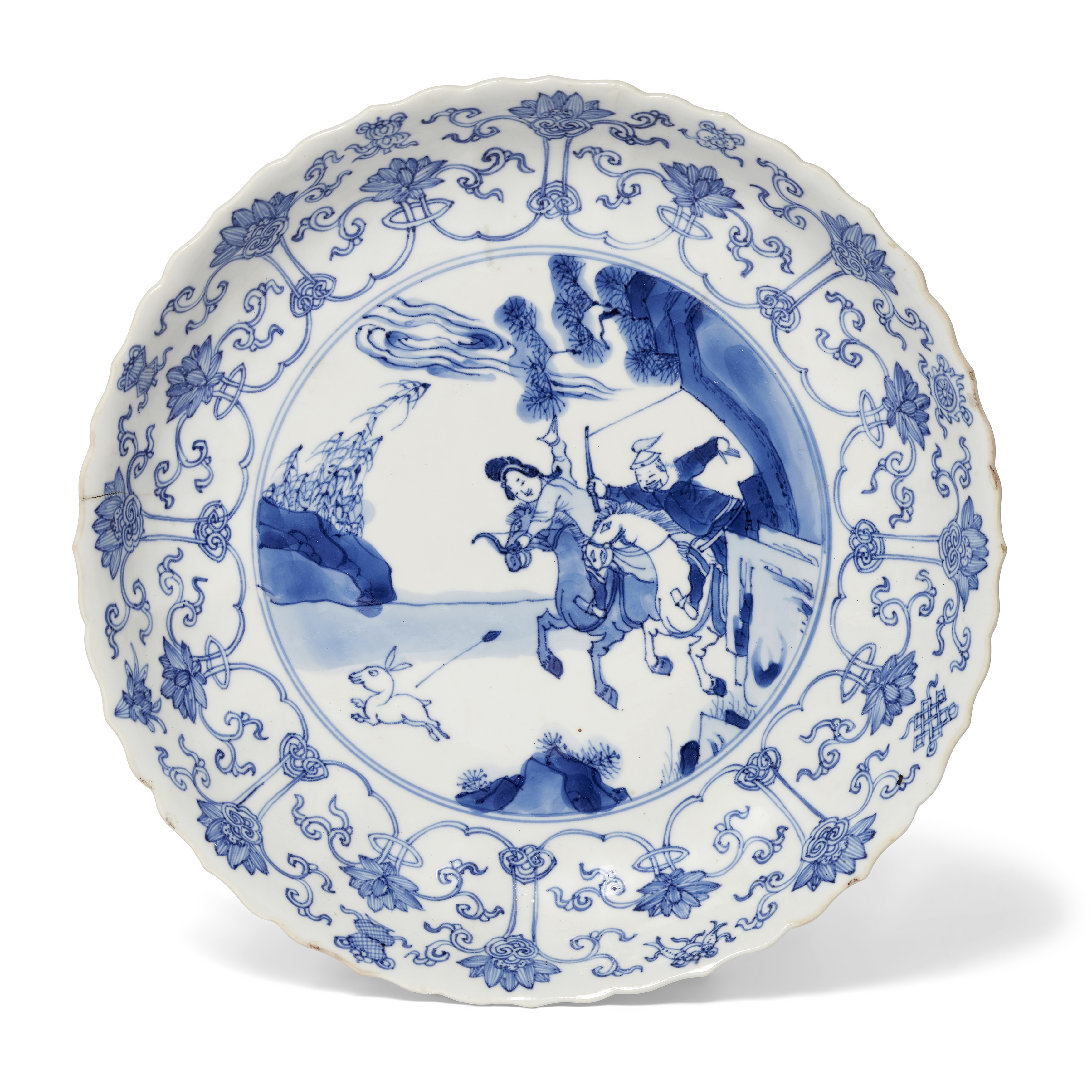 A Chinese blue and white 'hunting' plate Qing dynasty, Kangxi period, apocryphal Chenghua mark ...