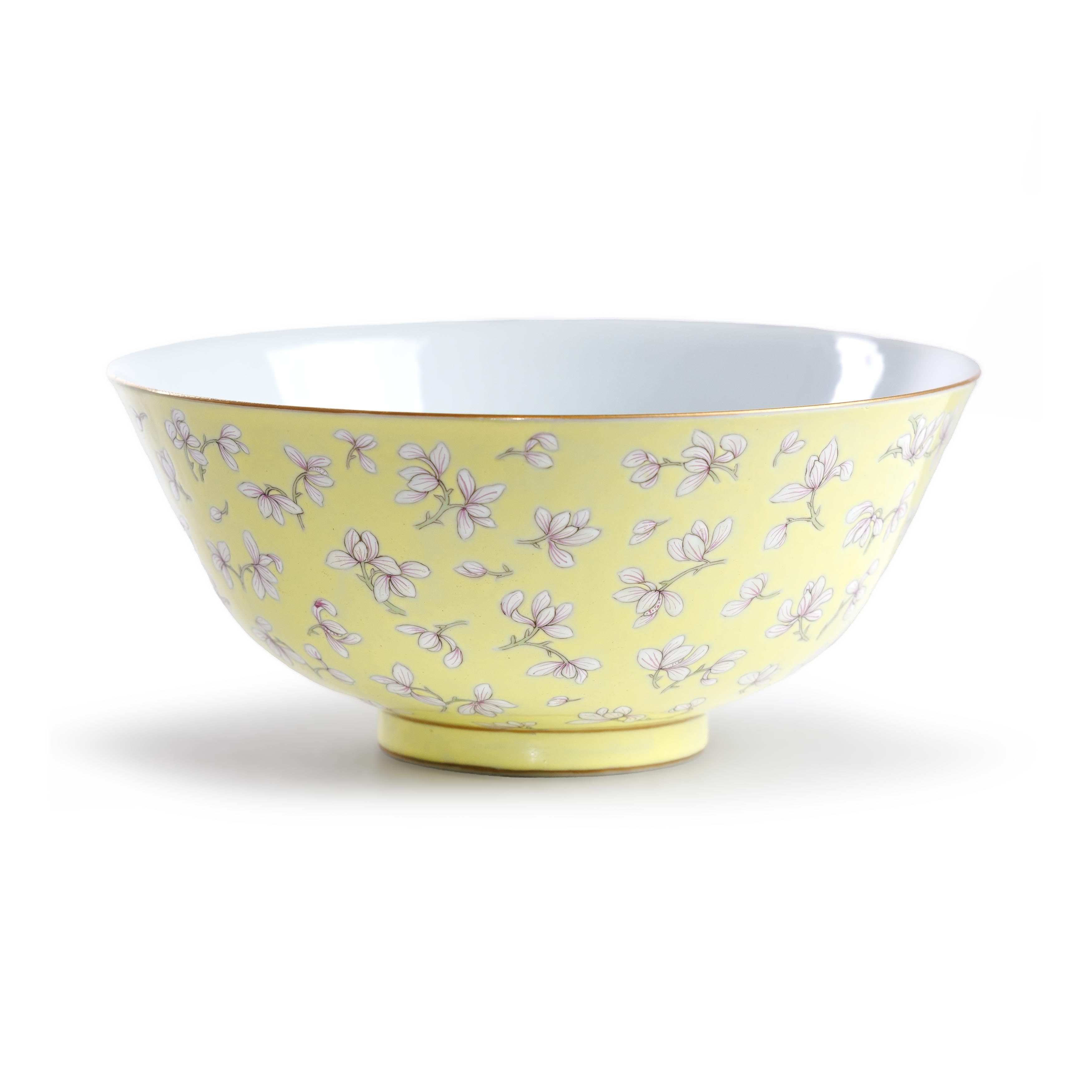 A large Chinese porcelain yellow-ground bowl Late Qing dynasty Painted in puce enamels with blo...