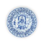 A rare Chinese blue and white 'Buddhist' dish Qing dynasty, Kangxi period Painted to the centre...
