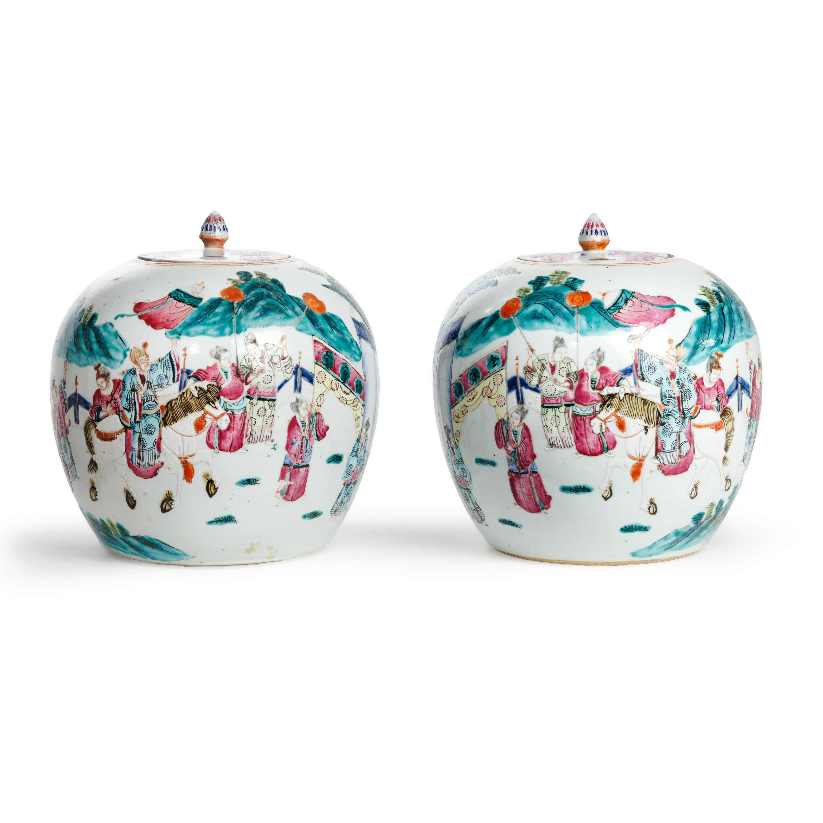 A pair of Chinese oviform jars and covers Late Qing dynasty Brightly enamelled around the bodie...