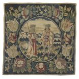 A North European tapestry panel, C.1700 Woven in wools and silks, the central roundel depicting t...