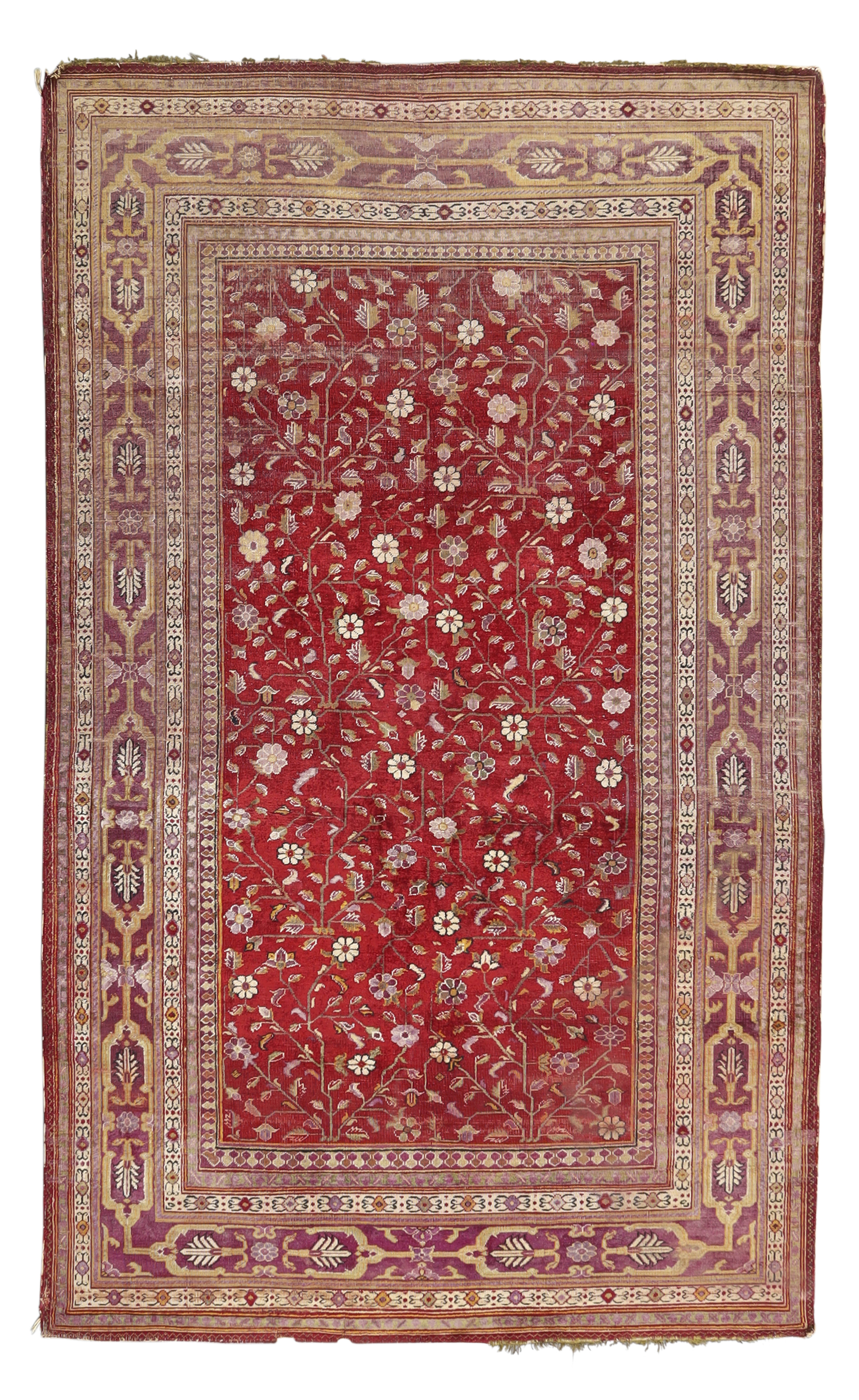 An Indian silk rug, Probably Deccan, last quarter 19th century, The central field with stylised f...