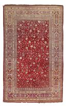 An Indian silk rug, Probably Deccan, last quarter 19th century, The central field with stylised f...