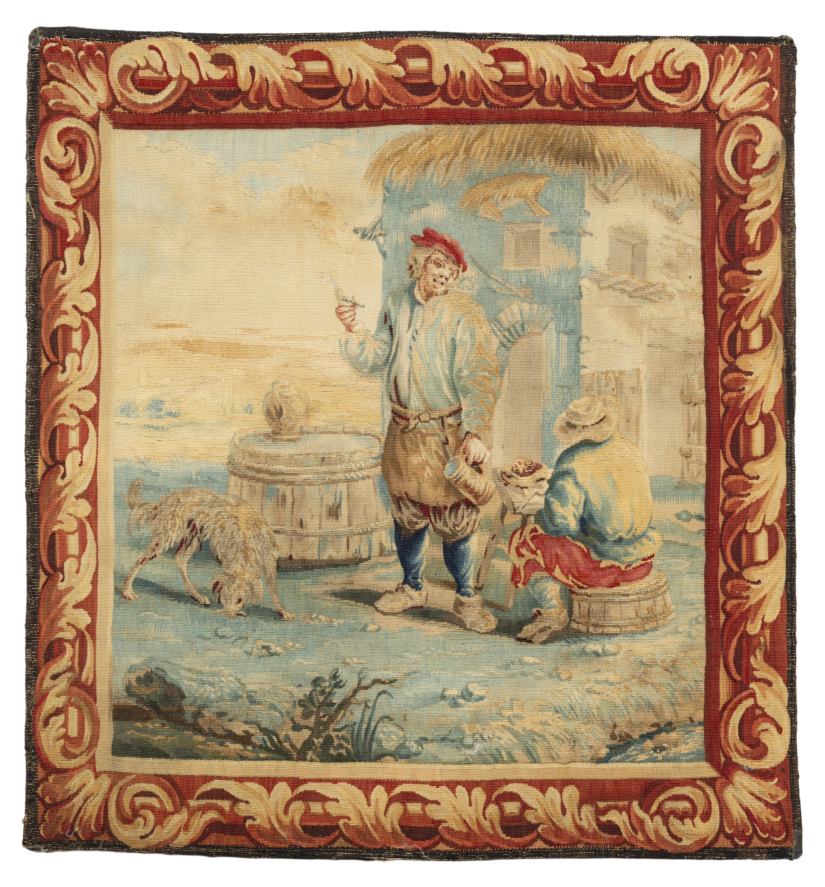 A Flemish tapestry panel, 19th century, Woven in wools and silks, depicting a man stood beside a ...