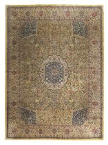 A Persian Tabriz carpet, Second quarter 20th century,  The central field with floral medallion su...