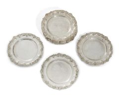 A set of twelve Elizabeth II silver side plates, London, 1962, Collingwood & Co., Of shaped circu...