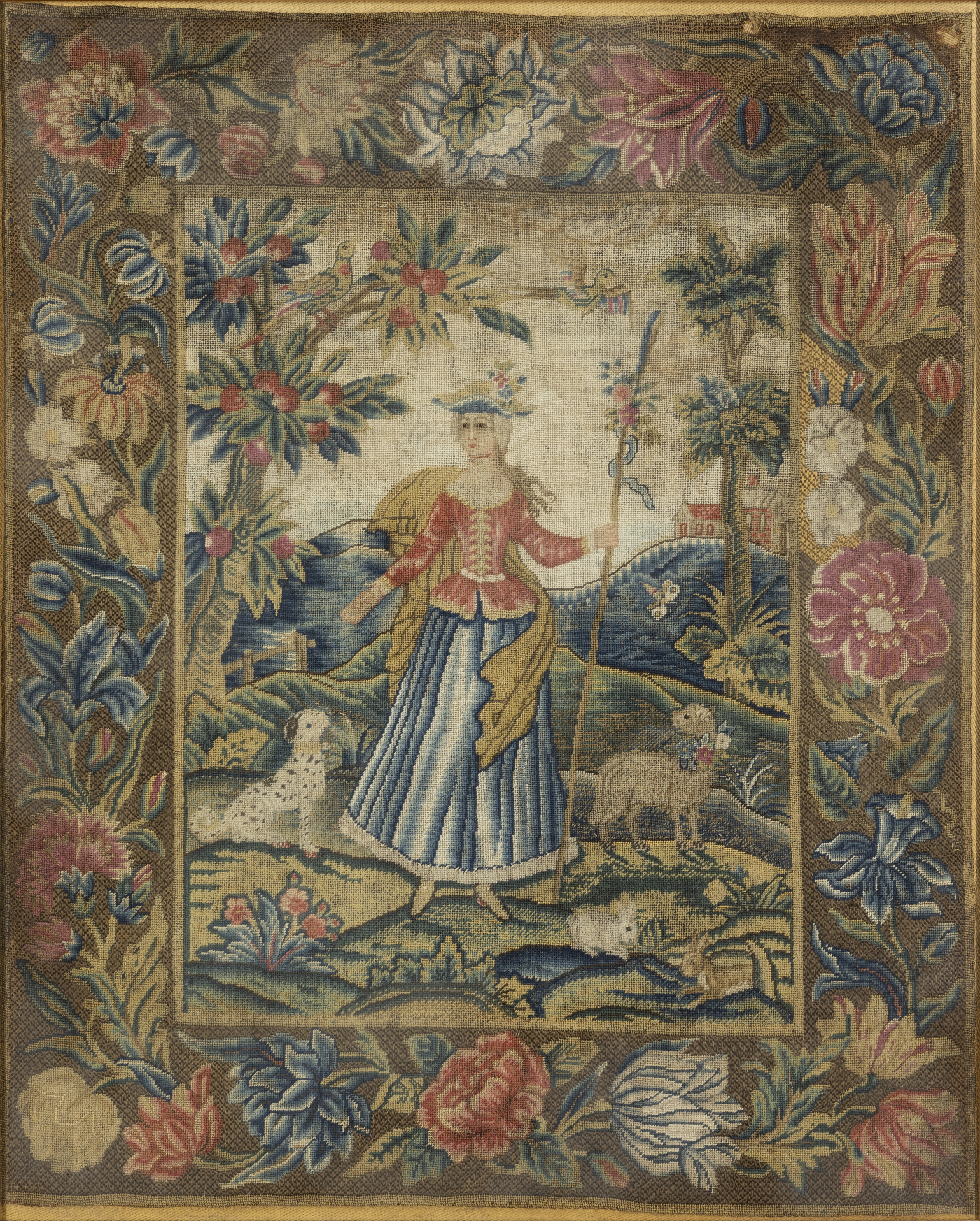 An English needlework panel, Early 18th century,  Worked in wools and silks, depicting a shepherd...