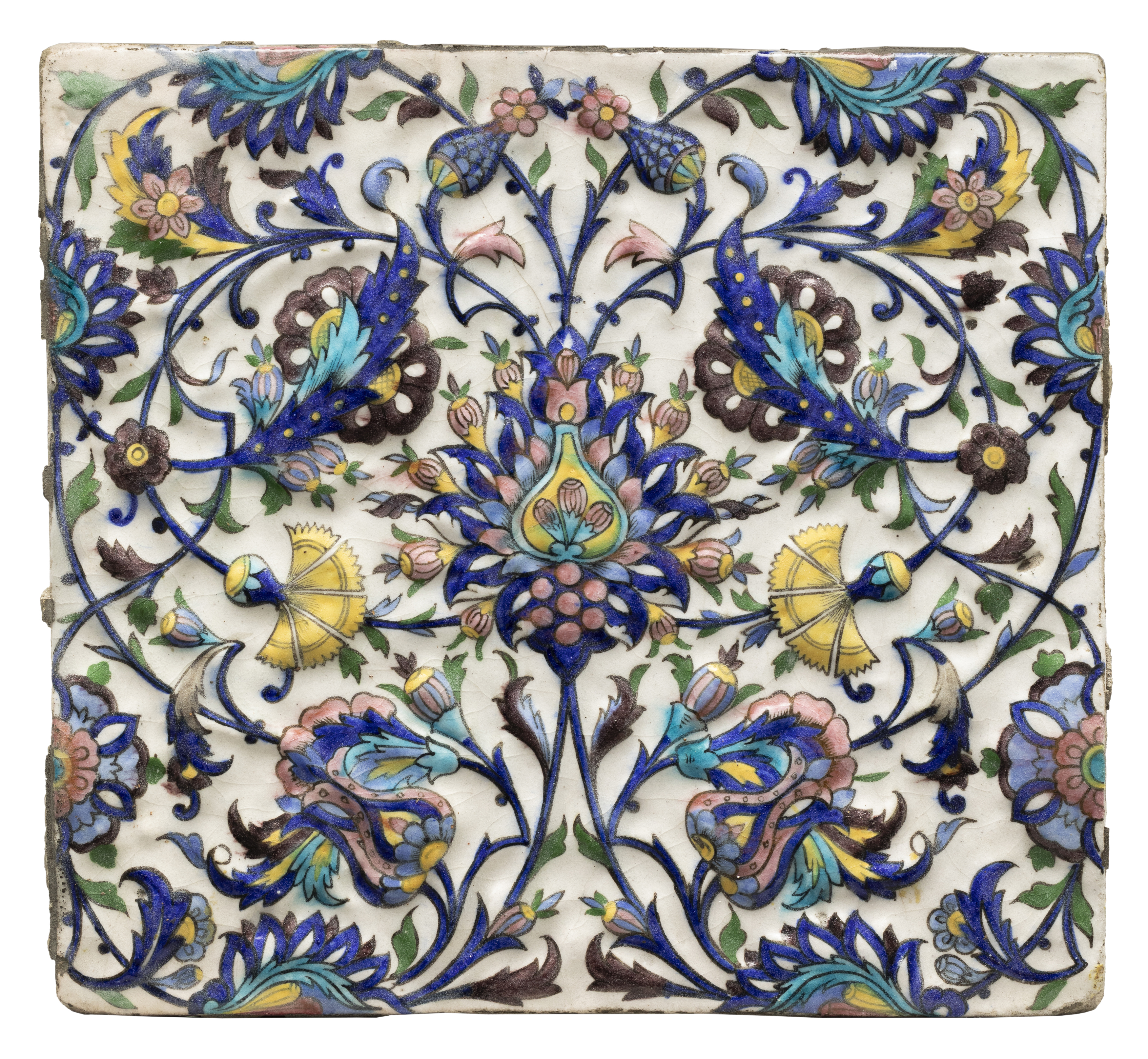 A square moulded polychrome pottery tile in the Iznik style,     Qajar Tehran, Iran, c.1890, The ...