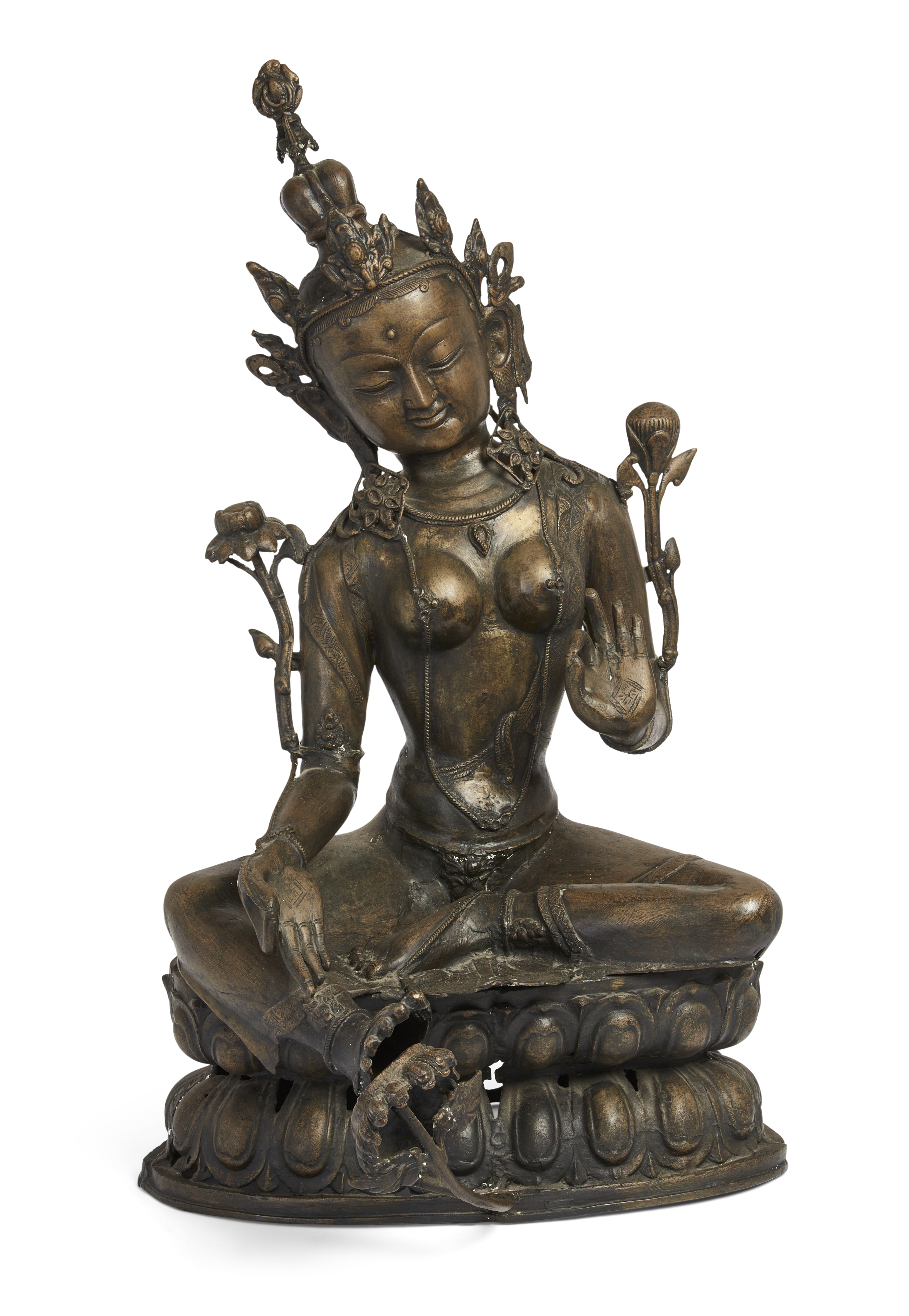 A massive Tibetan copper alloy figure of Tara, Early 20th century, Seated in lalitasana on a pier...