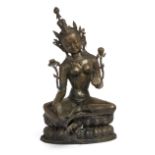 A massive Tibetan copper alloy figure of Tara, Early 20th century, Seated in lalitasana on a pier...