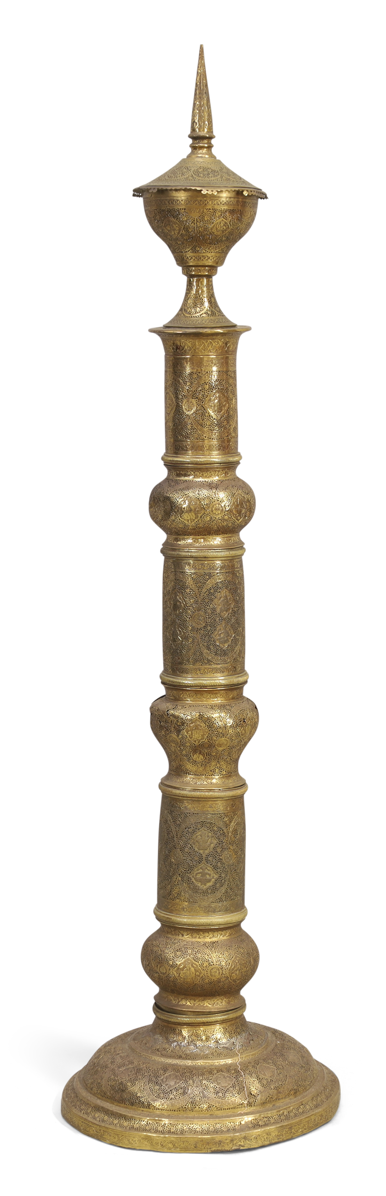 A Qajar openwork brass torchstand,  Iran, 19th century, On raised circular foot, the stem consist...
