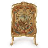 A French giltwood firescreen, Early 20th century, Inset with a piled wool picture of Aesop's fabl...