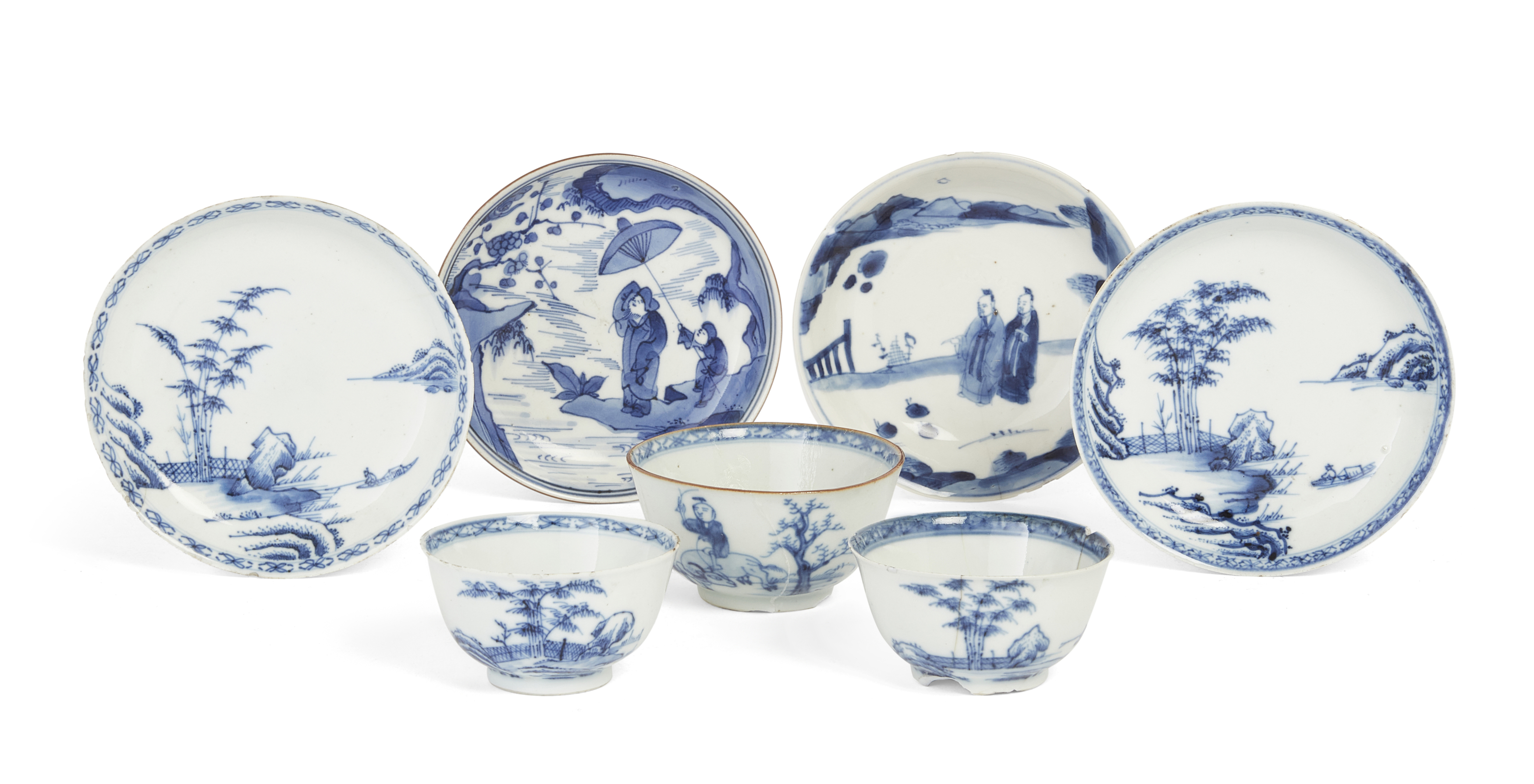 Six Chinese blue and white saucers and three tea bowls, 18th century, One saucer painted with two...