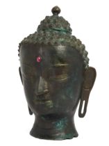 A large Thai bronze head of Buddha, 20th century, Cast with a serene expression, with inset pink ...