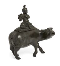 A Chinese bronze ‘boy on buffalo’ censer, 17th / 18th century, Modelled as a boy seated playing a...