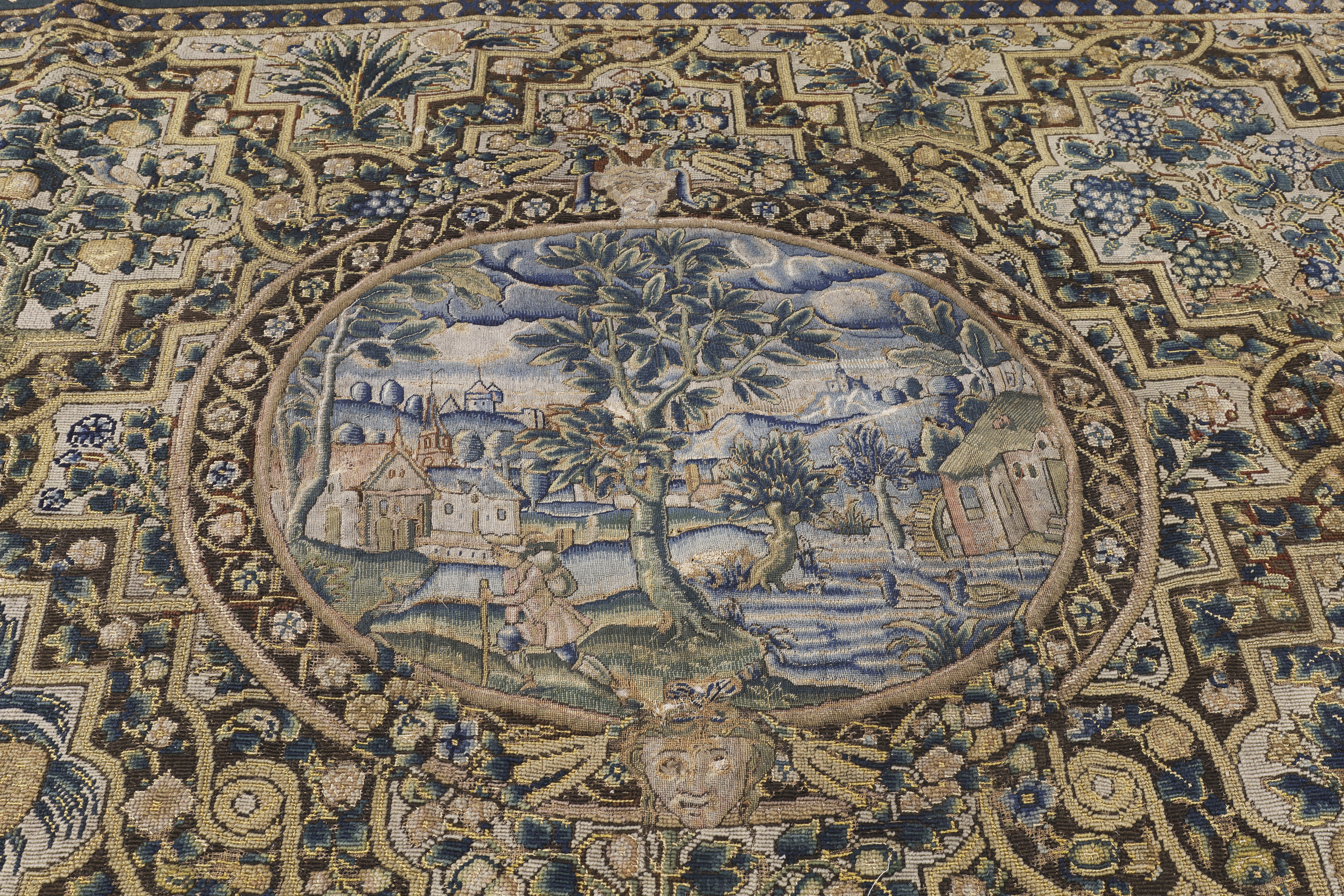 An English needlework table carpet, 17th century, Worked in wools and silks, centred with an oval... - Image 2 of 4