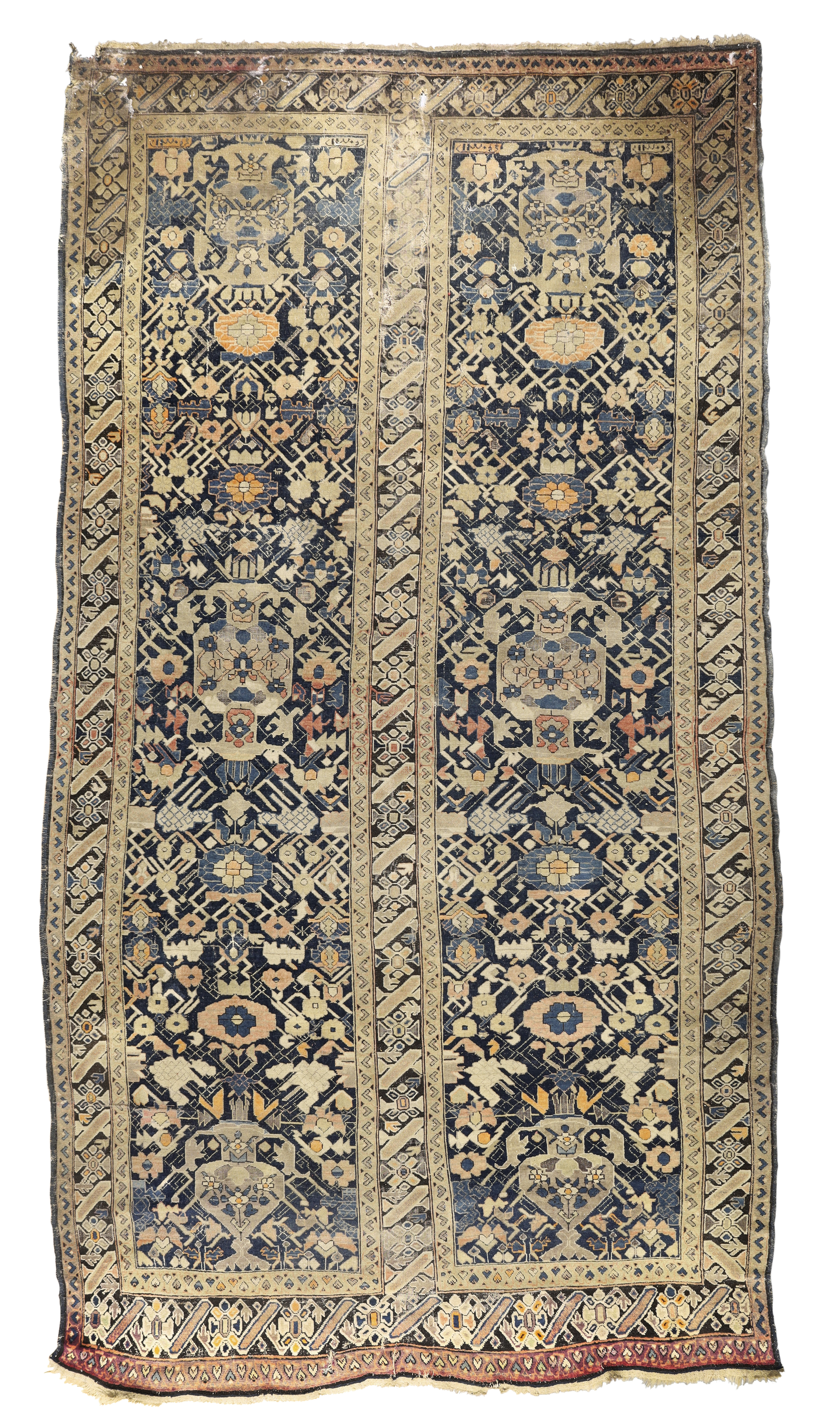 A Persian Karabagh carpet, First quarter 20th century,   The two long fields with geometric vase ...
