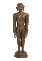 A copper alloy standing figure of Bahubali, South India, Karnataka, 19th century or later, On cir...