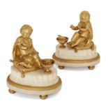 A pair of French gilt-bronze figures of infants, Second half 19th century, Each shown seated on a...