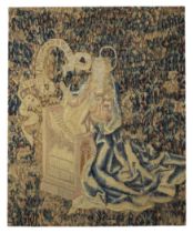A Flemish millefleurs tapestry fragment of St. Cecilia, First half 16th century, Woven in wool, t...